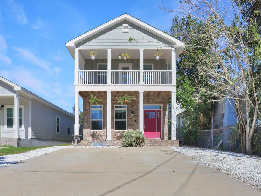 Built in 2019 and situated near downtown Pensacola, this home seamlessly blends modern style with warm, welcoming spaces. The covered front porch creates a place to pause before stepping inside, and the south-facing balcony brings in soft light throughout the day. The first floor opens into a bright, comfortable layout that feels instantly livable. The kitchen features granite counters, stainless appliances, beadboard-style cabinets, recessed lighting, and a pantry. It connects naturally to the dining and living areas, creating a space where cooking, gathering, and relaxing flow together. LVP flooring, a half bath, and downstairs laundry add everyday convenience. Upstairs, the primary suite offers a retreat-like feel with its tray ceiling, walk-in closet, dual sinks, and private door to the balcony. This space is ideal for morning coffee or quiet evenings. Two additional bedrooms and a full bathroom complete the second floor. The fenced backyard adds a sense of privacy with room for gardening, a firepit, or outdoor seating, and the shade sail provides comfort for sunny days. Brick and vinyl siding offer low-maintenance appeal, and the driveway provides off-street parking. All major systems are original to the 2019 construction. Nearby highlights include Wyer Park, Belmont DeVilliers, Legion Field, and local restaurants. The Palafox district is about a mile away, with Seville Square, the waterfront, and Blue Wahoo's Stadium within approximately one and a half miles. This convenient setting places downtown amenities, parks, and entertainment within easy reach.
