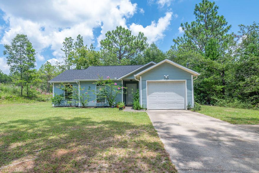This unique offers the best of country living on a spacious 1-acre lot. This home is strategically located for easy access to nearby amenities, a quick commute to town, and close proximity to main highways 188 (Airport Rd), 85, and 90 to take you to work or have fun; 35 miles away to our Emerald Coast sugary Beaches and conveniently situated near military bases such as the 7th Special Forces Group and Eglin Air Force Base.Nature lovers, this home includes a beautiful, untouched wooded area behind the house, approximately 0.35 of an acre in size; it provides ample space to enjoy private woods, expand your garden, or create a workshop with endless possibilities.