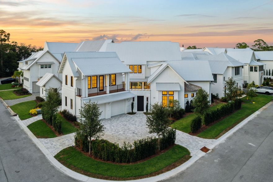 99 Perrin stands as a newly completed lakefront estate within the coveted enclave of Churchill Oaks, where Southern architectural tradition meets refined modern craftsmanship in the heart of Santa Rosa Beach.Spanning more than 5,600 square feet across three elegant levels, the residence offers five bedrooms, five full baths, and two half baths, each space designed with a discerning eye toward proportion, natural light, and seamless flow. Expansive porches extend living outward, while a private pool anchors the outdoor retreat. A two-car garage, plus separate golf cart garage completes the layout, balancing quiet comfort with effortless entertaining.What defines this home is its setting. Churchill Oaks is more than a neighborhood, it is a private architectural enclave... where over 40 acres of preserved green space integrate nature into daily life. Residents enjoy exclusive amenities including a bayfront clubhouse, resort-style pool, fitness center, and deepwater marina, all thoughtfully designed to cultivate privacy, permanence, and peace.