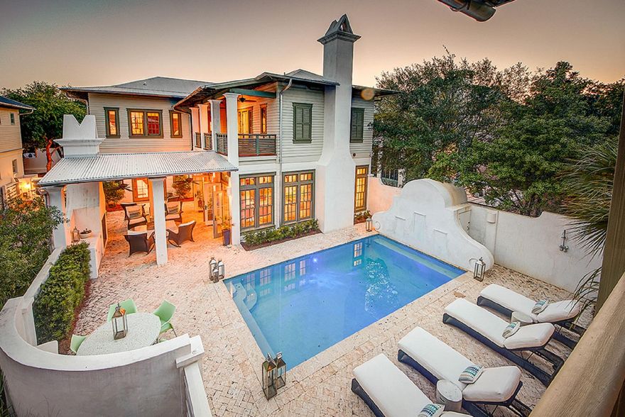 #OASISONKINGSTON IS PRICED TO SELL! Relax & unwind in your PRIVATE OASIS in the quiet part of ROSEMARY BEACH. CUSTOM HOME w/ a large shell stone COURTYARD, HEATED POOL & OUTDOOR FP. A LOGGIA provides shade & the HEATED POOL is a perfect place to COOL OFF. The OPEN LIVING CONCEPT ADJACENT TO THE OUTDOORS makes this the IDEAL HOME FOR ENTERTAINING. EZ access w/ French doors leading into MASTER SUITE ON FIRST FLOOR w/ luxurious bath. Up the open foyer stairs, there is a MEDIA DEN for the kids to gather. The 2nd MASTER SUITE plus 2 guest BR w/ ensuite baths have porches overlooking pool. A GOURMET KITCHEN has Thermidor appliances, 6-burner gas range, ice maker, 2 dishwashers, & a large pantry. CARRIAGE HOUSE over 2 car GARAGE & PLENTY OF PARKING in LONG DRIVE. Fenced backyard WON'T LAST!