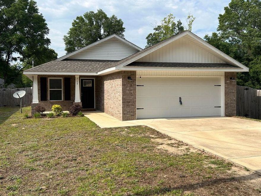 All brick construction features 2 car garage, covered porch off the kitchen for relaxing. Open floor plan features tray ceiling in living room, work island w/bar seating in kitchen, pantry, stainless steel appliances, shaker style cabinets with soft close doors/drawers,  additional bedrooms have large closets, master bathroom has double vanities and walk-in closet.  Carpet in bedrooms, luxury vinyl plank in common areas, quartz counter tops in kitchen and baths.