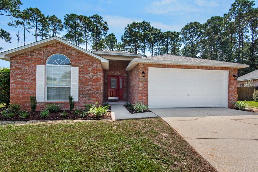 Completely remodeled and updated home, ready for its new owner! Located in Hidden Estates Subdivision, conveniently located just minutes away from A+ schools, restaurants, shopping, golfing, and of course the sugary white sands of Navarre Beach. The elaborate updates on this home include a new roof, new hot water heater, new flooring, new tile shower in the master bathroom, new vanities with granite countertops, new fixtures, new shiplap, new kitchen counter tops, new Shaker cabinets, new appliances, and fresh paint throughout. The home also boasts a screened in Florida room in back and large 2 car garage that both have freshly coated floors. Look no more, and act fast, this one won't be available long.