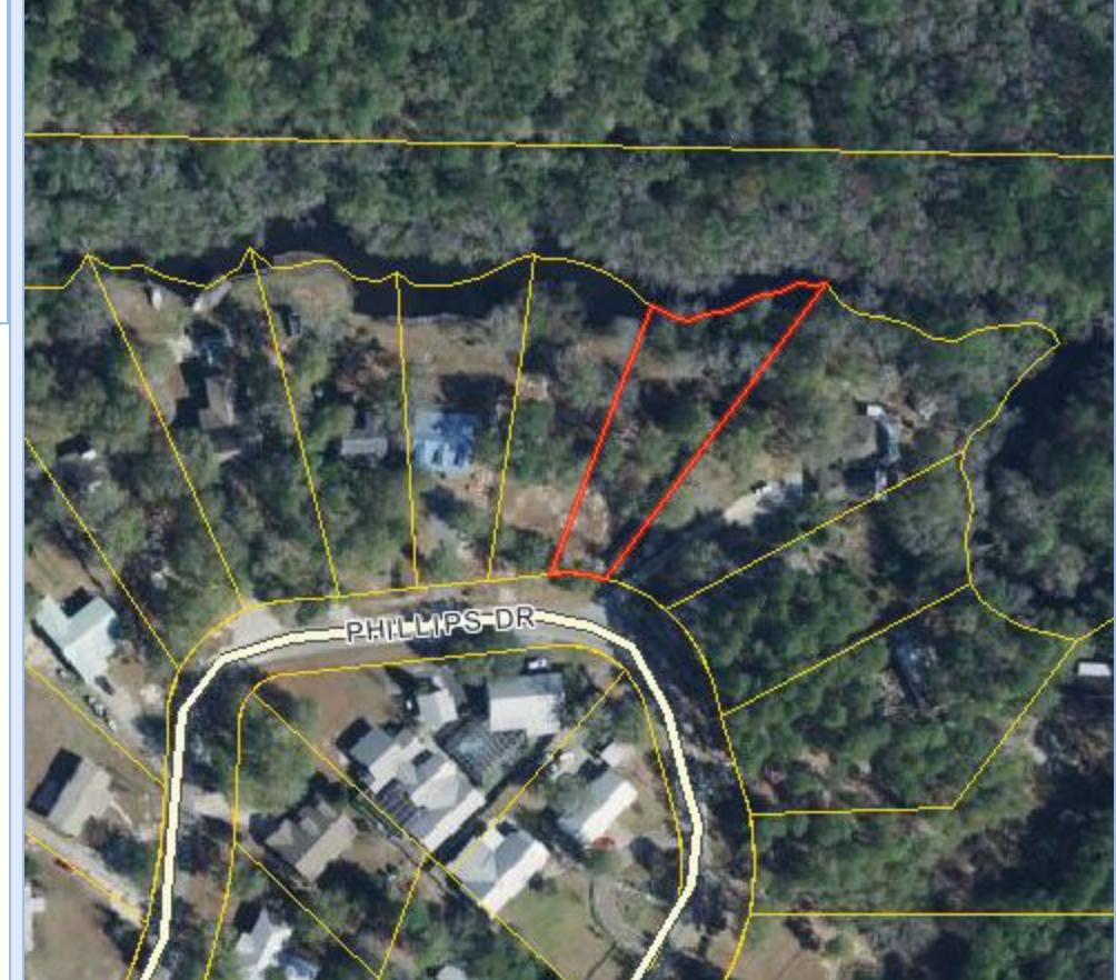 Half Acre vacant lot ready to build your dream home on. Conveniently located just a short drive from the white sandy beaches of Santa Rosa Beach and the popular 30A Scenic Highway, and just a short 10 minute drive into the town of Freeport.