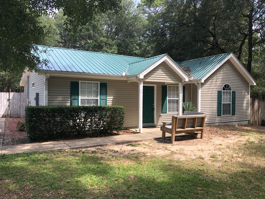 Great family home in the Mossy Head Community, minutes from Mossy Head Elementary School.  If you are looking for the perfect setting to raise your family or are looking for an excellent investment property, look no further.  Split floor plan, huge privacy fenced back yard and large storage building/workshop. This home has a large Florida room in the back that could be used in many ways to fit your family. Call today to set up your private showing before its gone.