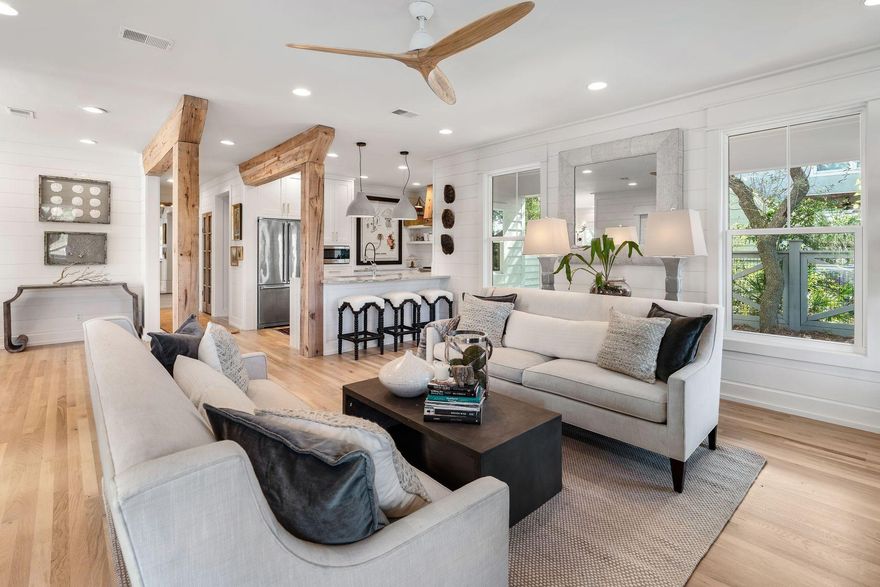 This incredible home has been taken back to the studs and fully remodeled.  White shiplap walls and high ceilings accentuate the spaciousness of its open floor plan as do the white oak wood floors that carry throughout the home. The stylish kitchen features quartzite counters, Viking stainless steel appliances including a coveted gas range and custom cabinetry.  The 2nd-floor spacious master bedroom includes a sitting area, a large bathroom with double vanities, and a generously sized shower, as well as a private balcony with a gulf view. The 3rd floor is currently a home office that could be easily utilized as a bunk room, media room, or playroom.  The private backyard oasis is home to a beautiful pool and paver pool deck.  Plans to accommodate a carriage house convey with the home. Ample parking allows this to be a great rental property or second home for large gatherings.  Located just east of WaterSound, this home enjoys a convenient location near beach access and The Hub. The home is being sold furnished with a list of exclusions.