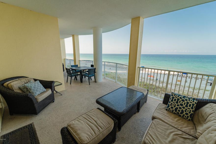 Awesome 4th floor unit at Ocean Ritz Condominium. There are a number of wonderful features about this unit such as: spacious floor plan, each bedroom comes complete with it's own private full bath (perfect for rentals), Gulf Front master with sliding door access to the huge balcony (incredible views), large open kitchen/living area with amazing views and one of my favorite features this unit is completely tiled (no carpet to mess with)! This unit is beautifully decorated and is being sold rental ready. On-site amenities include gulf front pool-heated seasonally, hot tub & exercise room. Unit also comes with it's own parking space. Ocean Ritz has a wonderful location! This complex is close to restaurants, shopping and local attractions. This is Gulf Front living at its finest. Come see!