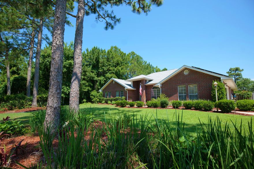 Welcome to the coveted community of Driftwood Estates. Upon arrival, you're embraced by lush landscapes and towering pine trees, setting the stage for a tranquil retreat. This exquisite 4-bedroom, 3-bathroom brick home sits on over half an acre, enveloped by a complete privacy fence in the rear yard and wooded preserve on the west and south sides. Stepping inside, you're greeted by an expansive, open-concept living space  with vaulted ceilings. The chef-inspired kitchen, boasting sleek stainless steel appliances and a custom double island, effortlessly facilitates memorable gatherings. Equipped with a double oven, walk-in pantry, and sleek island stove, culinary adventures await.

The generous master suite, featuring an ensuite bathroom, offers a haven for relaxation, complemented by ample space for a bedroom ensemble and lounge area. Meanwhile, the three additional bedrooms exceed expectations in size and convenience, sharing access to the two supplementary bathrooms.

Spanning nearly 3,000 square feet, this residence strikes the perfect balance between spaciousness and intimacy, ideal for both grand entertaining and cozy gatherings alike. Welcome home to Driftwood Estates.