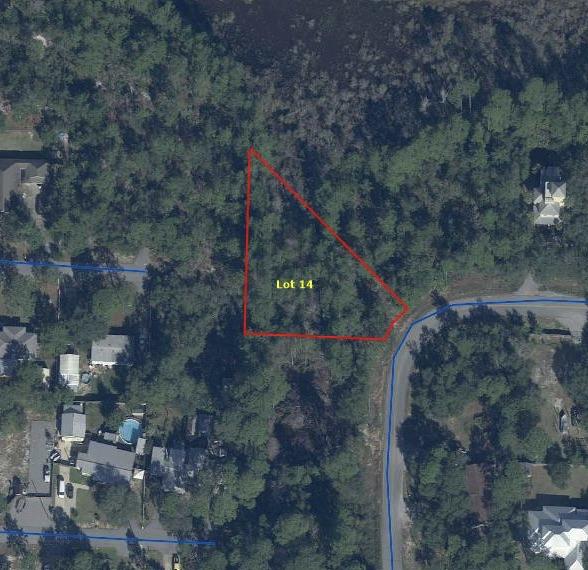 Beautiful wooded lot, recently mulched and ready for a new ownership. Lot is odd shaped, but larger than many other lots within the area.Conveniently located to bay access, County Highway 30A, beaches, restaurants, etc. No HOA, minimum build out time. Don't miss the opportunity to purchase a vacant lot at a great value.