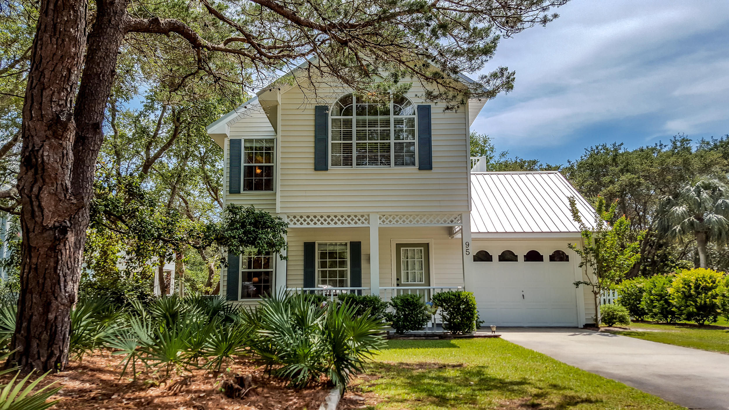 This wonderfully UPDATED 3 BEDROOM BEACH CHARMER with GULF VIEWS sits on a sizeable lush lot in the classic southern-style community of Seabreeze. The 3rd FLOOR OBSERVATION DECK provides SWEEPING VIEWS OVER SCENIC 30A & THE GULF OF MEXICO. This property is a rarity. GULF VIEW HOMES at this price don't appear often on 30Abetter come quickly. Home is just moments away from the beach accessapproximately 350 yards. The backyard is expansive; plenty of room to add a pool. Recent updates include solid oak floors on second level, modern white-washed wood-grain tile across first floor, tile backsplash in kitchen, Trane air conditioner & more. Expansive screened-in porches on first & second floors offer relaxation & easy outdoor living. Plus an interior GLIMPSE OF THE GULF from open living.