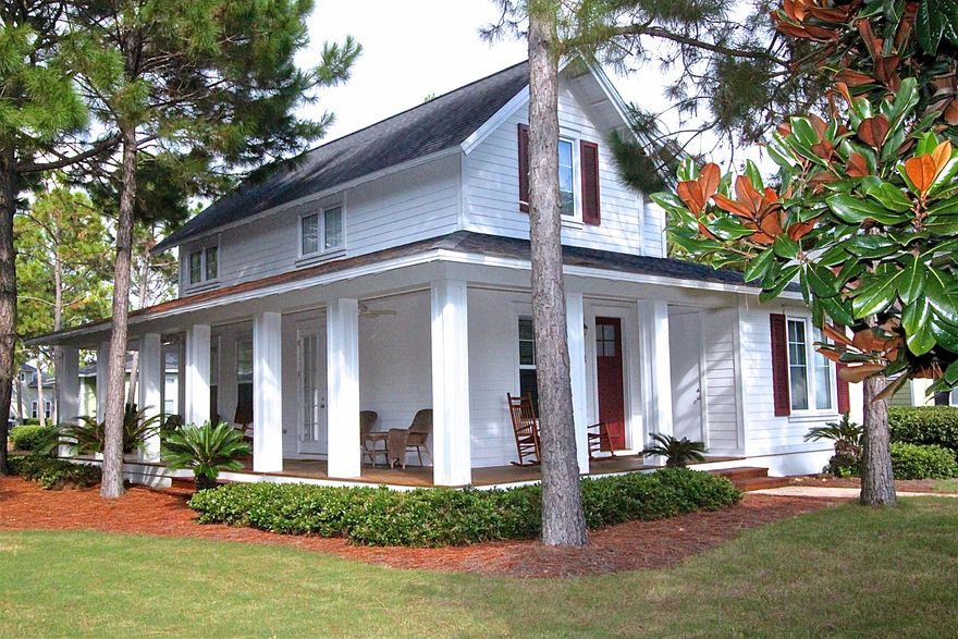 This charming vacation home comes fully furnished, and is superbly located in the picturesque Laurel Grove community at Sandestin Resort. The Laurel Grove Clubhouse is located about 30 yards away and features a private fitness room, heated swimming pool, hot tub, lounge chairs, and outdoor BBQ grills with a mini-kitchen. The property has a strong rental history with repeat guests, and generates approx. $36-38K in yearly rental income. This Key West styled home is designed with stunning wood floors and open airy spaces. You will find a fully equipped kitchen complete with bar seating and an adjoining dining area.