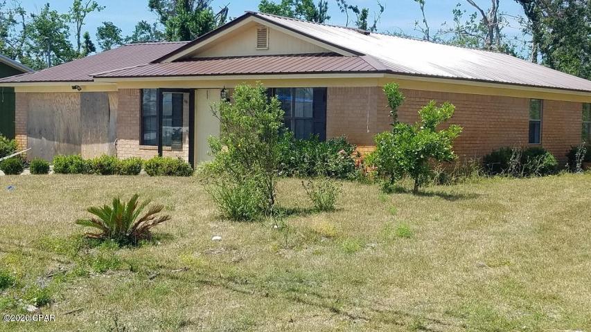 LARGE price reduction and $2,000.00 selling Bonus to buyers agent. This property is less than 10 minutes to Tyndall. This brick house would be very nice with a little TLC. The house has a metal roof and structurally in good shape. It is in need of refurbishing. Nice neighborhood with good proximity to schools and services. Nice size backyard with a 2 car garage. This would a excellent investment rental property or permanent home.