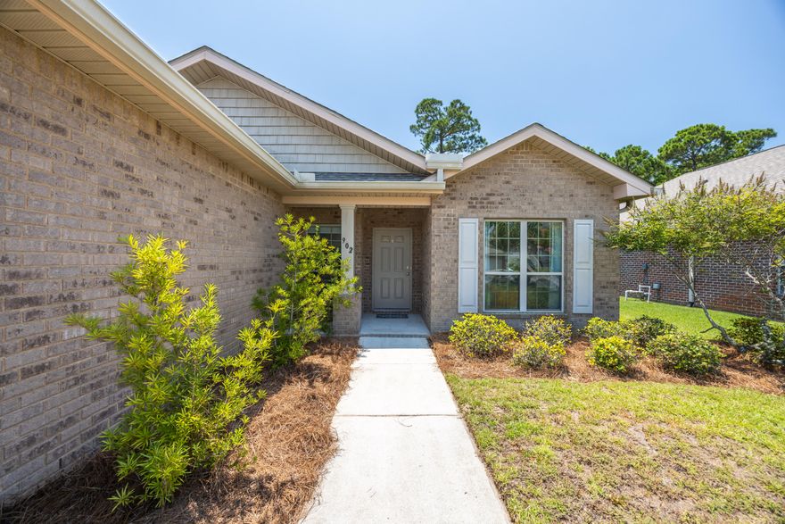Fully remodeled home--no corners were cut in preparing this beautiful property for its next owner! Approx. $48K in upgrades within the past 3 years, most of the upgrades have been done within the last three months while making this home ready for the new lucky owner!High-quality materials throughout: recently installed LVP flooring, new HVAC system (2023), new carpets, new hot water heater, updated light fixtures, ceiling fans, faucets and sinks. The kitchen has been fully remodeled with freshly painted solid wood cabinets, brand-new quartz countertops, and new fixtures. All appliances stay, including a new washer and dryer set (2024). The home features an easy-to-maintain all-brick exterior and a deep lot. A wide and deep back porch (14 x 10) opens to fully fenced backyard. The original roof has durable 30-year dimensional shingles, which provide 50% more life than standard shingles. A new irrigation pump.

Additional features include double-hung windows with removable storm panels,  and two-panel interior doors throughout. The living room features full glass doors that bring in plenty of natural light. The split-bedroom floor plan offers privacy for all. There's a raised snack bar, and the formal dining room could easily be used as an office or a fourth bedroom (no closet). The master suite includes a separate shower and garden tub.

The two-car garage includes an automatic overhead door opener and a pull-down ladder for easy attic access. The AC unit is located in the garage, freeing up interior space and reducing indoor noise.
Located in Driftwood Estates, a neighborhood with very reasonable HOA fees and great amenities: park area, playground, tennis courts, large community pool, basketball court, soccer field, and a catch-and-release pond. Ideal for walking and biking. No short-term rentals allowed.

Just minutes from Publix, Grand Boulevard shopping and entertainment, medical facilities, and Sandestin Resort with world-class golf, beaches, and dining.Short drive to Topsail Hill Preserve State Park, offering over 3 miles of uncrowded beach access and two large coastal dune lakes. Schedule your showing today!
