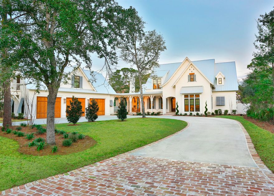 Welcome to Botany Bay, a secluded, gated neighborhood filled with live oaks surrounded by the waters of Hewitt Bayou, close to all the necessities & luxuries of life. This custom-built home by Velvet Sun Builders exceeds all expectations and leaves no detail behind. Private custom pool in process of being installed! Rendering coming soon. This home on 70' of Hewitt Bayou the 1,000 sq ft custom covered dock is your gateway to the Bay and the emerald waters of the Gulf of Mexico. The master suite with private screened in porch overlooking the bayou, outdoor spa, his & hers walk in closets, soaking tub and marble shower is a retreat within this 5,790 Sq Ft home. In addition to the Master, the main floor contains a guest suite, private den with painted brick walls, open dining/living room,