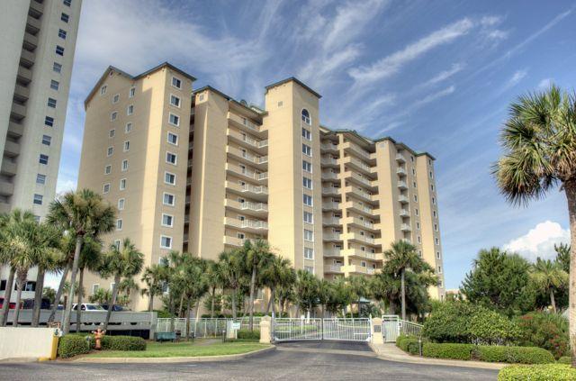 Grand Villas at Hidden Dunes is the premier non rental building at the beach with the utmost privacy. The complex boasts 500 feet of deeded beach access and the owner will include a private beach set-up (through the end of the year) and umbrella as well as being sold finished. The floor plan includes three bedrooms and three baths with the master having fabulous gulf views. This unit also has a private wrap around balcony for lounging all day watching the surf, and an outdoor grill for al fresco dinners. This unit is priced right and will not be on the market long..!!!!