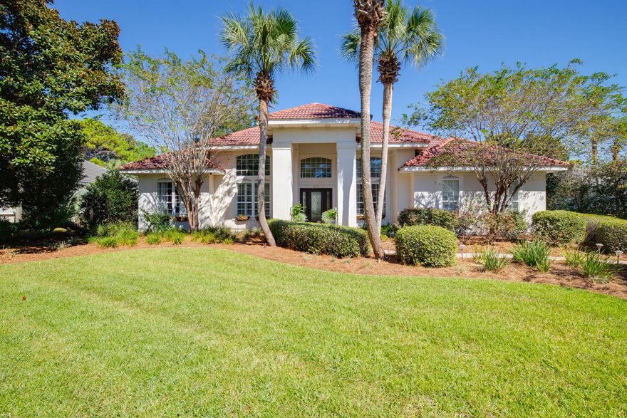 Situated within the gated community of Regatta Bay, this spacious lakeside property provides a wonderful layout, ideal for primary living as well as for those looking for a secondary home in one of Destin's most desirable neighborhoods. The interior of the home showcases a blend of tile and hardwood flooring in the living spaces, while additional features such as a formal dining room, home office, and open floor plan offer the perfect mix of traditional styling with modern day conveniences. Vaulted ceilings, a two-car plus golf cart garage, and a freshly painted interior creates a desirable coastal atmosphere within the property.