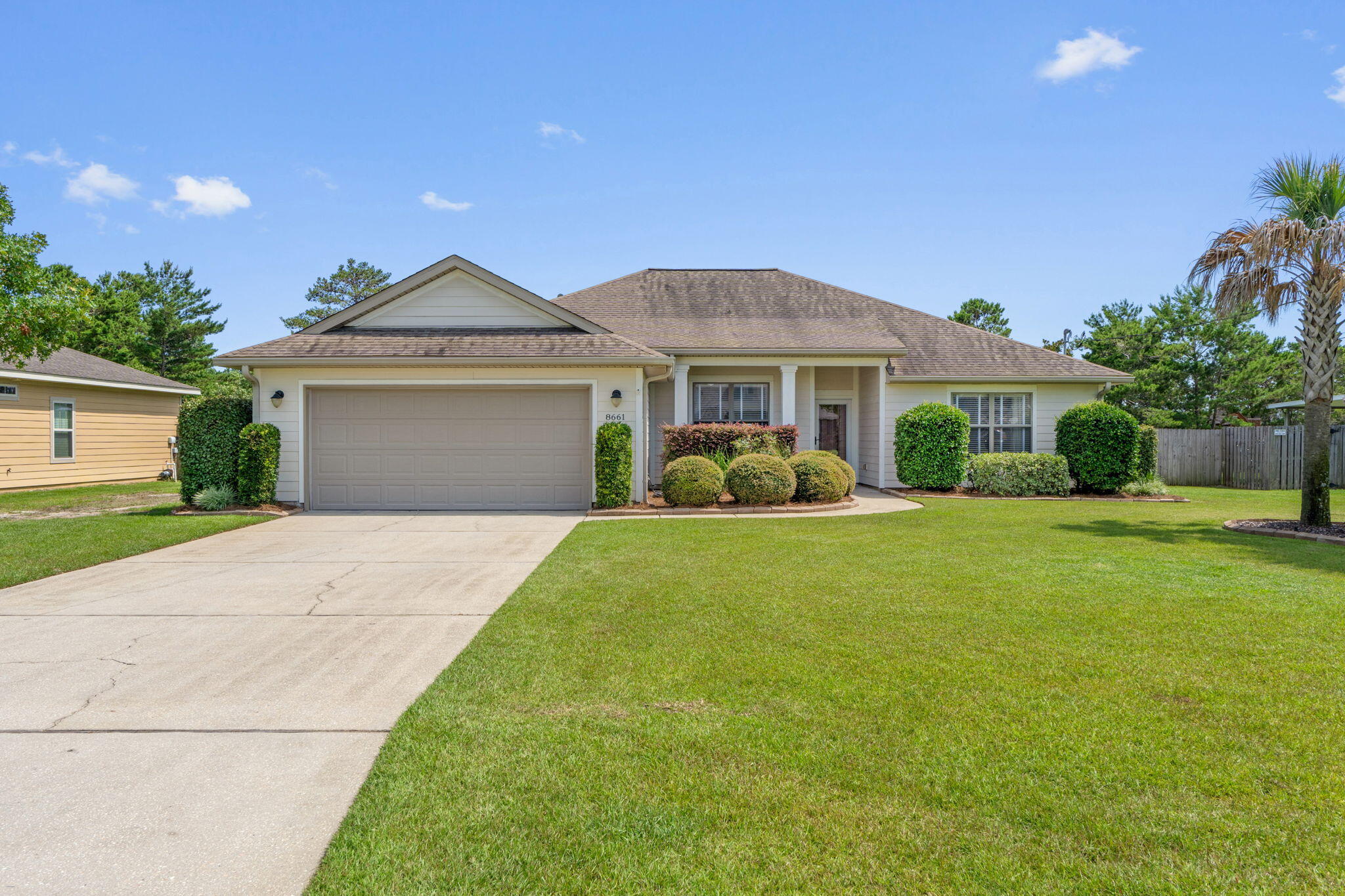 Custom built Robbins Home with 10 foot ceilings in the living areas. Well maintained, clean and ready for new owners! Bright and open large living room. Kitchen has stunning maple cabinets, granite and stainless appliances. Breakfast bar & Pantry. Breakfast area. Tranquil primary bedroom with trey ceiling, updated spa like bathroom with both shower, tub & 2 closets. Split floor plan with 3 good sized bedrooms and bath on the other side of the home. Super cute laundry room! Oversized garage is extra long and can fit most vehicles. .46 Acre lot gives you plenty of room if you want to add a pool and/or workshop in the fully fenced backyard. Sewer and NO HOA!!! Just minutes from Navarre Beach, restaurants and shopping.