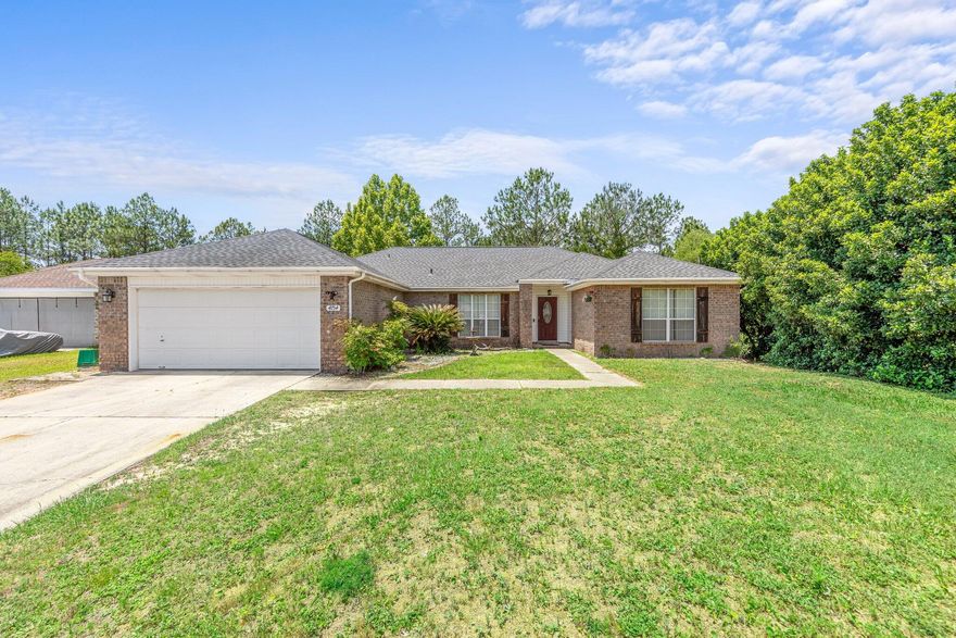 Yall! It's in South Crestview! This ranch style, open floor concept home is ready for new owners. This 4 bedroom abode has many amazing features such as stainless appliances, his and hers walk in closets in the master bath, AND a LARGE lot with a pond for your own private getaway. Owners even left the split floor plan in place for parents sanity. Living here is a short commute to Eglin AFB and Duke Field. When it's your free time, remember it's about a 35 minute drive to our gorgeous sandy beaches. Welcome Home! NEW ROOF in 2021, water heater in 2021. Measurements are deemed to be accurate but buyer to verify.