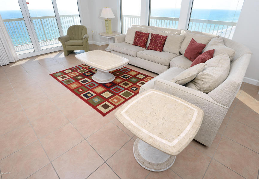 The pinnacle of Gulf front living! This Beautiful 2BR/Bunk/3BA condo offers what some consider to be the best views from any condo in any development in Panama City beach. Massive wrap around balcony is accessible from each bedroom and allows for breathtaking views of the Gulf and Bay. Bank of large windows along the west wall maximizes views from the interior. Pride of ownership really shows in this one of a kind property new paint and carpet in 2017! Open concept kitchen with ample cabinets and counter space overlook the main living and dining area. Gulf side master suite boasts large Master Bedroom, garden tub, walk-in shower, and access to the balcony. Bunkroom lives like a 3rd bedroom. HOA dues include electricity.