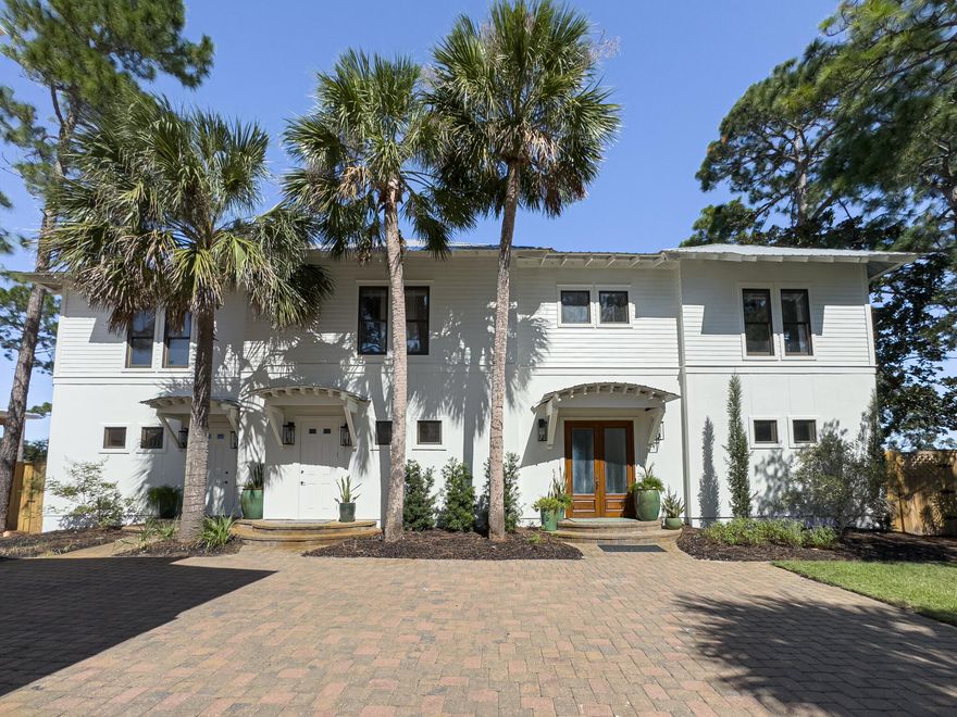 Nestled along the tranquil shores of Choctawhatchee Bay in Santa Rosa Beach, this magnificent bayfront estate combines luxury, privacy, and the ultimate coastal lifestyle. Encompassing over half an acre with 100 feet of prime waterfront, this property offers breathtaking views, direct access to the bay, and exceptional spaces designed for both relaxation and entertaining. Its location provides a gateway to world-class fishing, boating, and water sports, along with close proximity to Scenic 30A--a destination celebrated for its pristine beaches, gourmet dining, boutique shopping, and vibrant cultural events.The main house 4 bedroom 5.5 baths, spanning an impressive 6,300 square feet, features architectural elegance and an open-concept design.  The carriage house 2 bedrooms and 1.5 baths Upon arrival, a grand foyer with soaring double-height ceilings welcomes you with unobstructed panoramic views of the Choctawhatchee Bay. The first level showcases a chef's kitchen outfitted with bespoke custom cabinetry, professional-grade stainless steel appliances, and floor-to-ceiling windows that bathe the space in natural light while framing serene waterfront vistas. Expansive living and dining areas flow effortlessly onto the resort-style pool deck, complete with a heated pool, spa, and oversized sun deck, offering the perfect setting for hosting elegant gatherings or savoring quiet moments by the water.

The second floor is anchored by a palatial primary suite, where floor-to-ceiling windows reveal elevated water views, creating a serene private sanctuary. The spa-like ensuite bath boasts dual vanities, a walk-in shower, and a private water closet. Six additional bedrooms, five full baths, and two half baths provide ample accommodations for family and guests, while a theater room with a wet bar and an upstairs bonus space offers luxurious areas for entertainment.

The guest house, perched above the detached three-car garage, adds another 1,500 square feet of refined living space. Designed with meticulous attention to detail, it features two bedrooms, two bathrooms, a fully equipped kitchen, and a spacious living and dining area. A wraparound porch with tranquil water views and an interior staircase further enhances its charm and privacy, making it a retreat for extended family or distinguished guests.

For the boating enthusiast, this property is unparalleled, featuring a private dock with a boat lift, a Jon boat/kayak launch, and a seawall. Its location provides direct access to the water while maintaining close proximity to the vibrant 30A corridor, renowned for its world-class dining, boutique shopping, and cultural events.