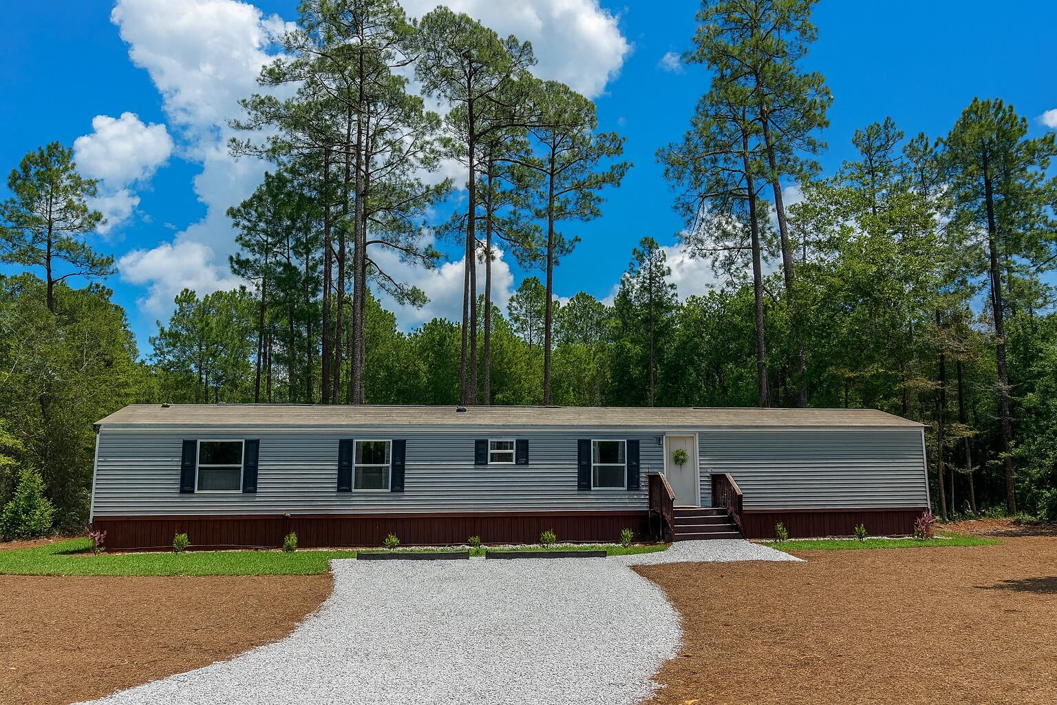 YOU BETTER HURRY- FABULOUS PRICE - AWESOME DESIGN - BRAND NEW, NEVER LIVED IN! This Clayton Sunsations 4BR/2BA manufactured home features laminate flooring throughout, an open floor plan, and a beautiful kitchen with large island, new appliances, and even a big-screen TV included. The master suite offers a walk-in closet and private bath. Enjoy energy-efficient construction, a quiet and peaceful setting, and an outdoor fire pit for relaxing evenings. Great location with easy access to schools, shopping, and historic downtown DeFuniak Springs. Move-in ready -- Hard to find a four-bedroom house at this price! Call Today!