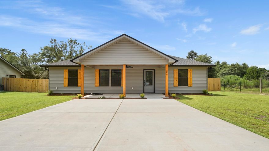 Welcome to this stunning new build where quality meets value. Front porch is inviting with cedar posts, cedar-clad ceiling, and ceiling fan.  The open concept with vaulted ceiling and luxury vinyl plank flooring add a bright and durable touch throughout. The kitchen features a large island, quartz countertops, soft-close cabinets, GE stainless steel appliances, and farmhouse sink.  The primary bedroom offers comfort and privacy with an en-suite bath that boasts a tiled shower and upscale fixtures that gives a luxury experience.  Outdoors, enjoy a fully sodded yard, a 6-foot privacy fence perfect for entertaining and family fun.  Let's not forget the expansive laundry room for those families that need extra storage. Seller to contribute $9000 in closing costs with full price offer.