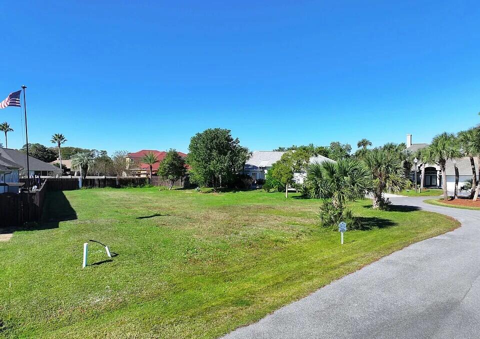 Envision life near the Grand Lagoon and the Gulf of Mexico! A cleared lot is now available in the desirable Palm Bay subdivision, offering the perfect foundation for your future coastal home. And the best part? Engineered stamped house plans are included, ready for you to start building! Secure your piece of this charming neighborhood today, whether you're building soon or later.