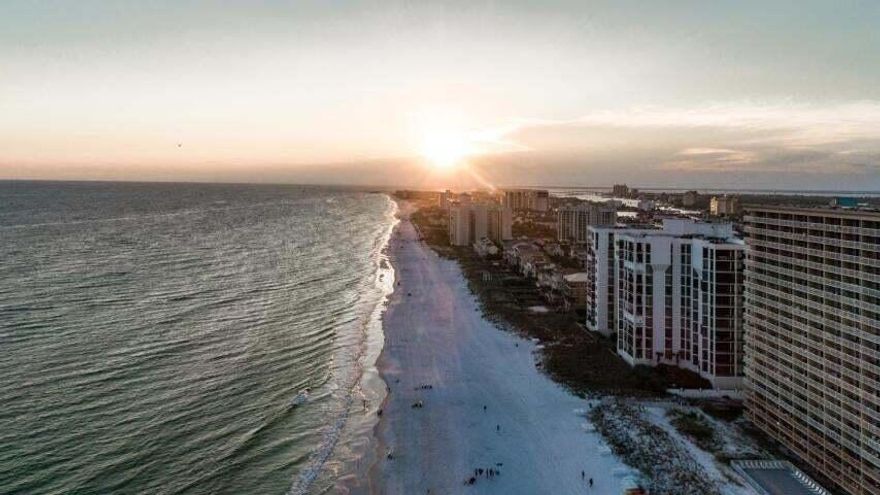 Welcome to your new Beach Destination! This COMPLETELY and NEWLY remodeled 3-bedroom beach condo sits just steps from the beach and is one your friends, family and vacationing guests will enjoy for a lifetime. Kitchen boasts endless quartz countertops, storybook cabinets, stainless steel appliances + more! NO CARPET! LVP flooring throughout. Sold Fully furnished + the tranquil decor provides the ultimate relaxing beach experience. Master bedroom features a walk-in closet + a private entrance to the deluxe and private balcony w/ dreamy views! Soak in the sun at the large, beautiful community pool, expansive decks, picnic area w/ BBQ grills or take short walk to a private gated beach access to the gorgeous white sand beach on the Gulf of Mexico.