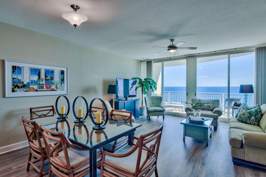 BEST VALUE in AQUA RESORT with NEW FLOORING to boot!! This unit offers a fabulous floor plan and is very popular for rentals, as it offers 2 bedrooms, 2 full baths and additional space that is easily used for bunks. The seller has just installed beautiful new flooring through the entry hall, kitchen, living and dining room. Picturesque gulf views from almost every room, tasteful furnishings, and ample gulf front balcony makes this unit perfect for relaxing and so easy to keep the sand between your toes within just a few steps off the elevator. Aqua offers premier amenities in addition to beautiful architecture as well as the sought after coastal vibe in a very upscale manner. Indoor/outdoor pool, separate hot tub, beachside grilling area, exercise facilities, garage parking with walkover for convenience, exquisite lobby and common areas...there is not much else you could ask for.