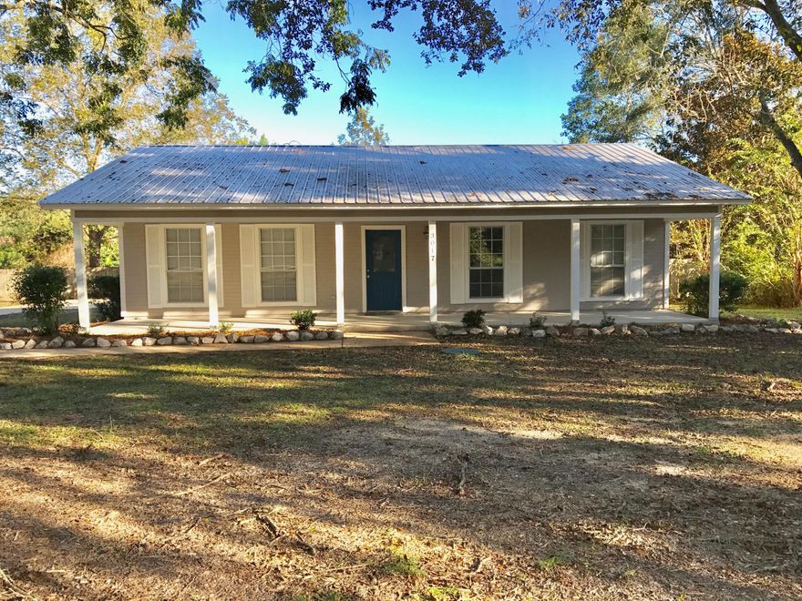 This beautifully renovated home sits on a large lot with beautiful pecan trees, large yard and swimming pool. Home features 3 Bedrooms and 2 baths. Granite countertops and new cabinets in the kitchen. New laminate wood flooring in the large, open living room. New Carpet in the bedrooms and new tile in the kitchen and bathrooms. New cabinets and in the kitchen and bathrooms. New stove, dishwasher and microwave in the kitchen.