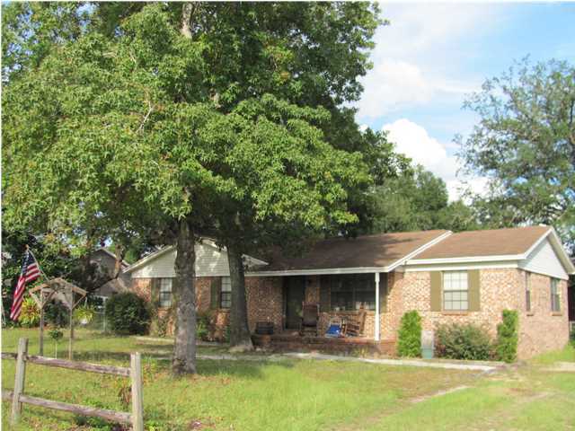 Well maintained brick home on a very large lot in a great area. Besides all the storage in the house there is a detached garage with a large storage room in the back as well as another storage facility attached to the same structure. There is a living room as well as a family room, dining area, kitchen has breakfast bar, laundry room with storage and all the bedrooms are a good size. Beaches are about 15 minutes away. The ''A'' schools are just minutes away. Destin and the beaches are just over the Mid Bay Bridge.