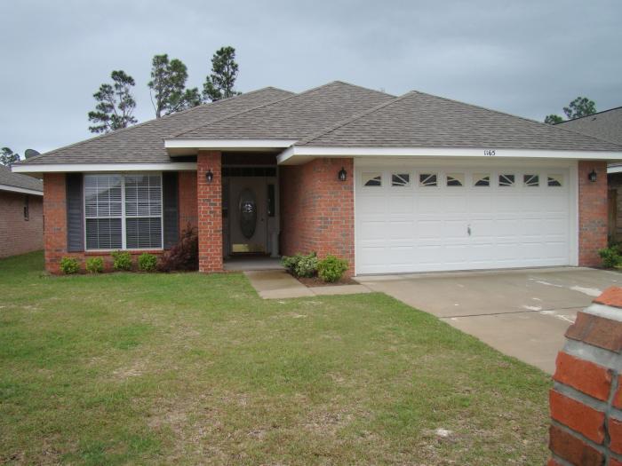Remarks: beautiful 4 bedroom, move-in ready home in the top A rated Gulf Breeze school system. This ONE owner, loved home features a spacious open floor-plan with no wasted space. This 4 bedroom 2 bath 2029 sqft. all brick home has tile and new carpet floors throughout! Large eat in kitchen , recessed lighting, and large pantry. Laundry room off of kitchen, Split bedroom design. Master bedroom has recessed lighting and a large walk-in closet. Master bath has a large garden tub/shower. Large, back patio- perfect for entertaining or watching the kids play in fully fenced backyard.
