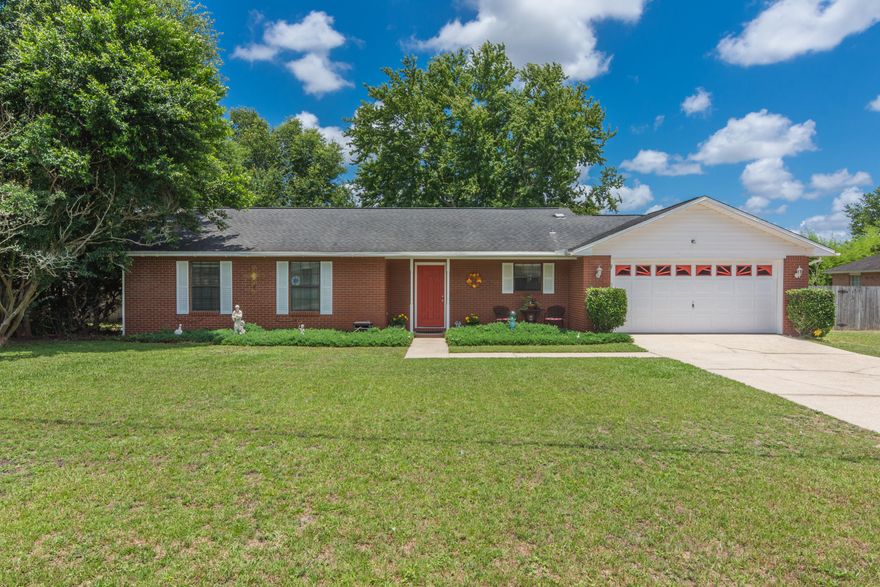 **BACK ON MARKET AT NO FAULT TO SELLER - Fall through on day of closing due to buyer financing!** Pride of ownership abounds in this extremely well maintained south Crestview home! Located on a FLAT, large (1/3 acre) lot, with a fully fenced backyard and shed. All brick home features 3 bedrooms and 2 bathrooms- NO CARPET! Tile and laminate throughout. Hardwood kitchen cabinets with tile backsplash. Kitchen has a roomy eat-in dining area. Additional notable features include programmable thermostat, updated ceiling fans and fixtures throughout, and new stainless steel kitchen appliances. HVAC was replaced in 2008 and has regular HVAC servicing with UV light protection installed. Oversized 2 car garage with NEW garage door opener! This home is move-in ready! Transferable termite bond in place. Schedule your showing today!