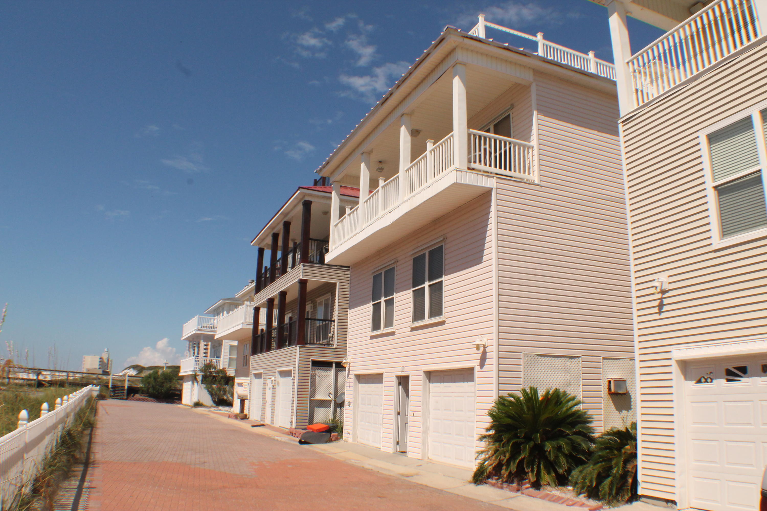REO - 4 Bedroom 3 Bath two Car garage, Roof Top Hot tub with Gulf and Bay Views! Deeded beach access Pensacola Beach! Prime vacation rental investment! Bring all offers!
