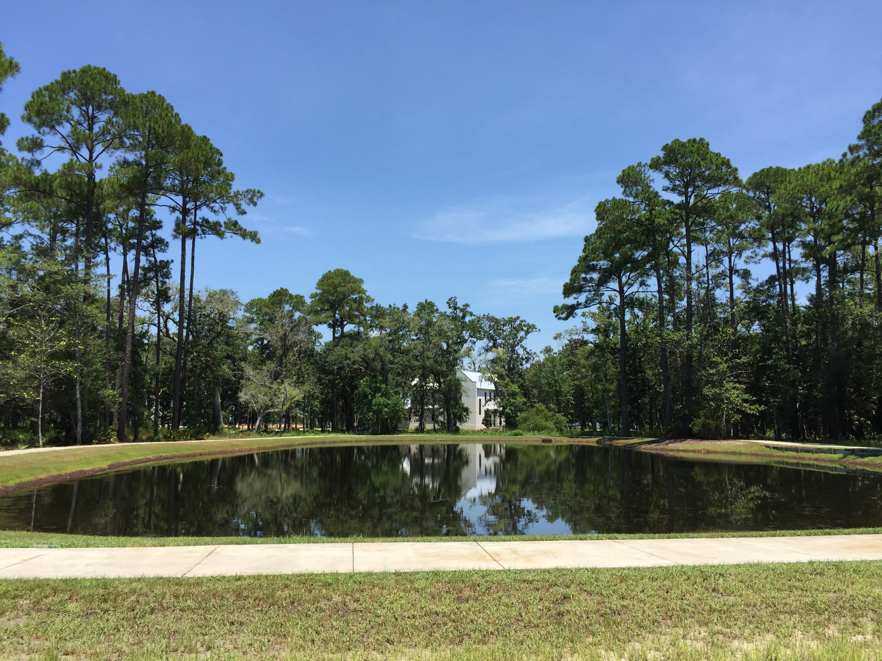Spectacular lake front home site with bay views in Churchill Oaks, south Walton's newest and most exclusive non-rental community. Situated on a spectacular property with over a mile of waterfront, the community's colonial and low-country architecture blends perfectly with existing vegetation and accentuates the style and grandeur of the south. All homes are required to be custom designed and custom built using the finest new and reclaimed materials and craftsmanship. Recently hand picked by the editors of Southern Living as the only Southern Living Inspired Community on the Emerald Coast, Churchill Oaks exudes charm, taste, and Southern spirit; the perfect place for families to gather, interact, and call home. Visit Churchill Oaks in person or on the web for more information!