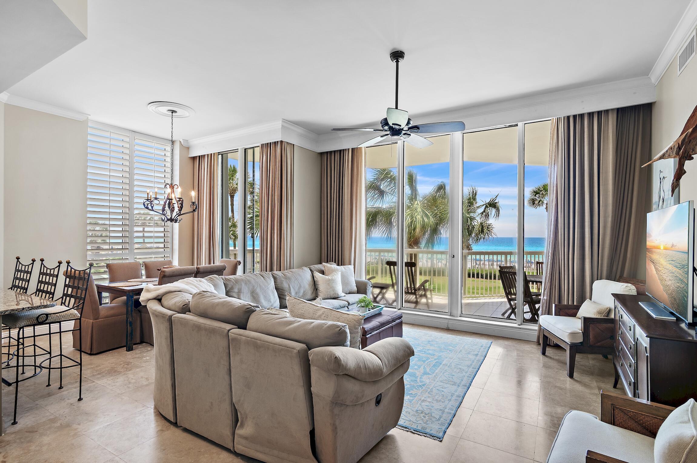 Welcome to this amazing 5BR penthouse at Silver Beach Towers. This exceptional two-story furnished penthouse, complete with a detached 2-car garage, offers a rare opportunity to own beachfront property like this in the heart of Destin. Boasting a spacious 3,682 sq. ft., this residence is poised to serve as a luxurious full-time Gulf-front home, a second home or vacation rental investment. With 2 Gulf-front master bedrooms, 3 additional guest bedrooms, and 6 bathrooms, including en-suite baths with whirlpool tubs and walk-in showers, this penthouse accommodates both comfort and elegance. Enjoy the convenience of two living rooms, your own private 2-car parking garage, a ground-floor patio terrace accessed from parking deck, and two separate balconies offering direct Gulf front views!
