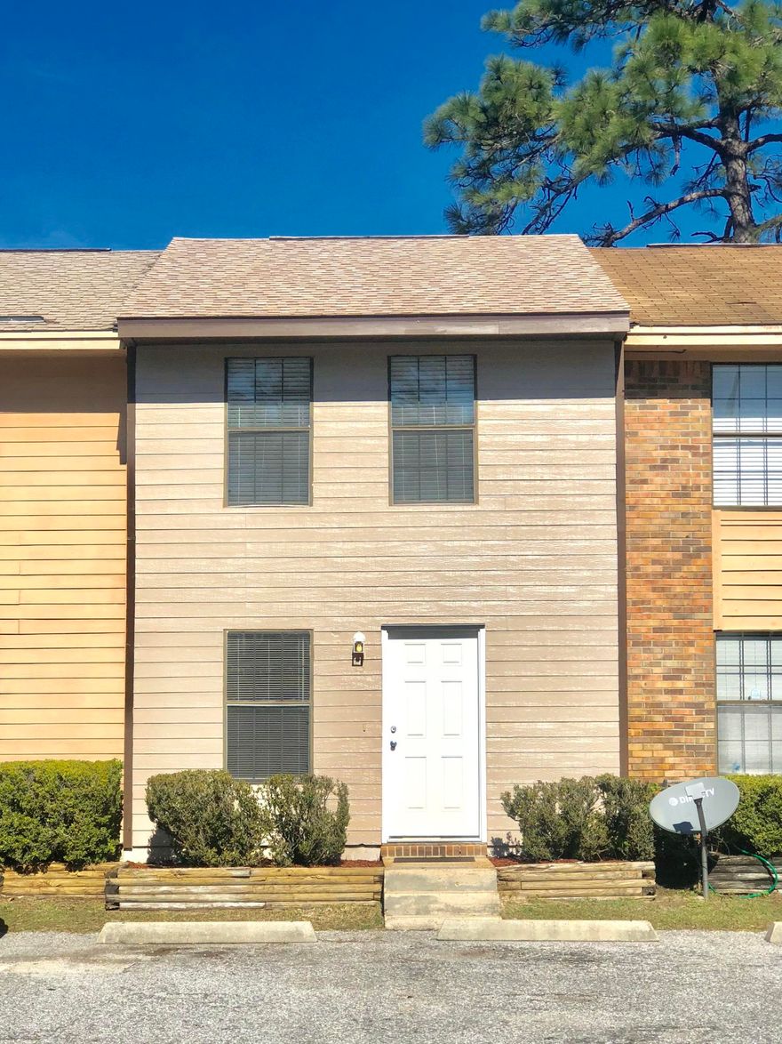 This sweet townhouse has recently been super spruced up to get ready for you to call it ''Home.'' Roof was replaced in April of 2018! Downstairs, you'll find brand new tile in the living room, newer tile in the kitchen, newly refinished cabinets, a large laundry room, and an adorable half bath for convenience. Upstairs is two good-sized bedrooms on either side of the full bathroom. The entire place has been recently painted, and any and all known issues have been completely repaired. This cute and fresh home's address is so appropriate because it truly is central to everything you could want: restaurants, the beach... and it's only 6 miles to Hurlburt, 4.5 miles to Eglin, and 17 miles to Duke.Pictures coming VERY SOON!