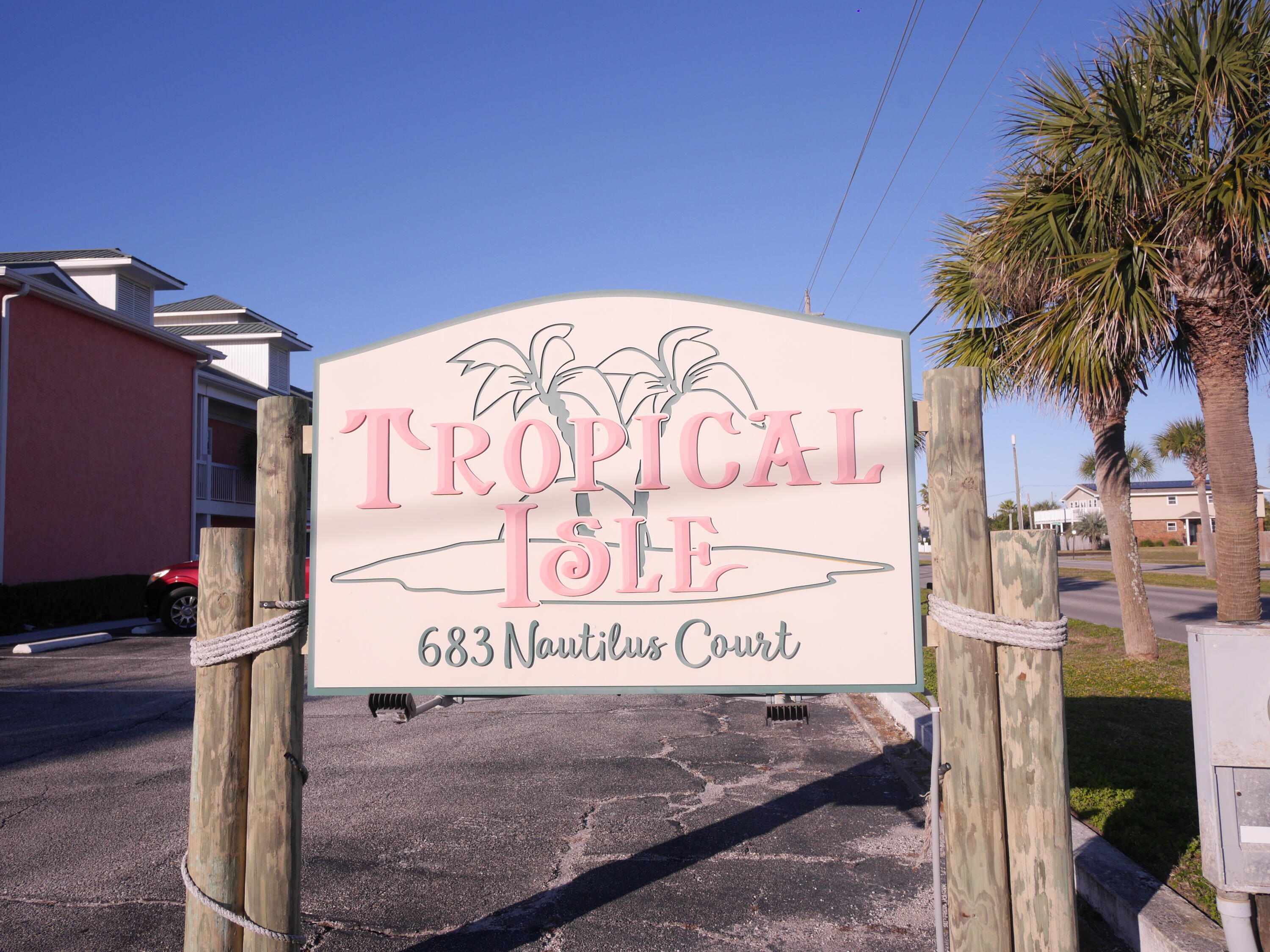 This is a ground floor 1 bedroom 1 bathroom condo at the Tropical Isle on Okaloosa Island. ONLY A 1 MINUTE WALK TO THE BEACH! This convenient fully furnished 1st floor unit sits directly in line with the beach access boardwalk. Unit features open living, dining & kitchen area ... flat screen TV's .. Nice size bedroom & access to the sun-filled patio and grassy area. Tropical Isle Complex offers barbeque area, laundry facility and private pool with a spacious deck.