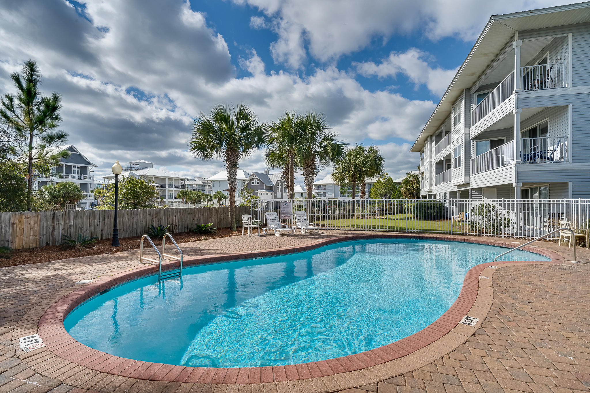 QUAINT & COZY first floor condo quietly tucked away in the beautiful beach front enclave of Beachside Villa's. Situated just steps away from the sugary white sands of the emerald coast, the unit comfortably sleeps 4 with two nice size bedrooms and an adequately spacious living & dining area. Freshly painted with quartz counter tops in the kitchen & granite in the bathrooms. The bathrooms have both been updated with nice finishes. A brand new air-conditioning unit was installed in 2020! Beachside Villas amenities include 2 tennis courts, 2 swimming pools, shuffleboard courts and a clubhouse for a large group.