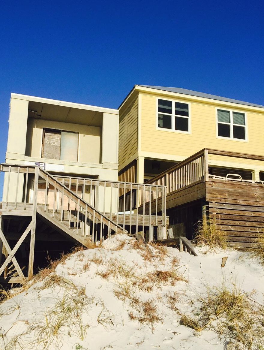 Finally, the opportunity of a life time of having an affordable gulf front home. The unfinished interior allows you to incorporate your own decorating ideas. Perfect to enjoy the sunsets on the large open deck, covered porch, or balcony. This can be your permanent home, vacation home, or an excellent investment property to generate extra income in a rental program.