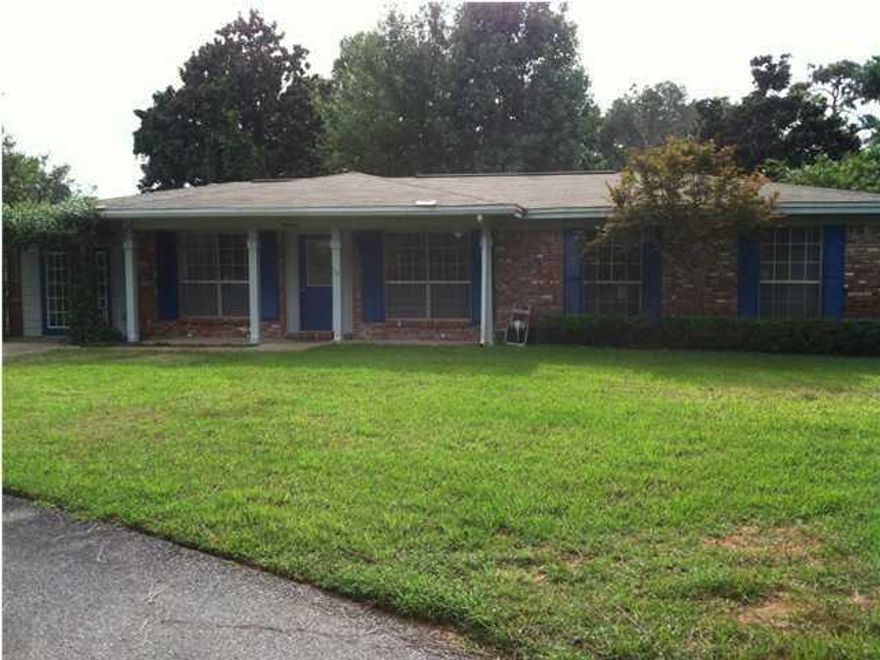 Nice updated home close to schools, dining, shopping, churches, & both bases. All electric! Lots of living space to enjoy! As you enter the home the living room opens to the dining area w/built in bookshelves. Kitchen has all appliances in place. Den also has built in bookshelves w/ a wood burning fireplace. Converted garage has several work benches, cabinets, w/d hook ups (w/d stay), window a/c unit & a separate entrance. Parquet & tile flooring throughout- no carpet! Outside you have a covered front porch & a partially covered back patio to enjoy. Fenced backyard. Roof & HVAC unit replaced in 2005. Call to see today!