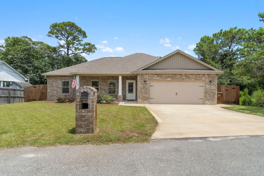 BACK ON THE MARKET! Welcome to your custom-built all-brick home nestled in a quiet cul-de-sac. This craftsman-style home has been meticulously maintained and lightly lived in. As you step inside, you'll be greeted by a large open living room. The tray ceiling with large windows allows natural light to pour in. This home features an open split floor plan with the primary bedroom to the back right of the main living room and the other bedrooms to the left. The kitchen features sleek stainless steel appliances, granite countertops, a convenient bar area for casual dining, and modern cabinets with soft-close hinges. The primary bedrooms provide plenty of space for a king-sized bed and nightstands. The open windows and tray ceilings provide a bright airy feel.