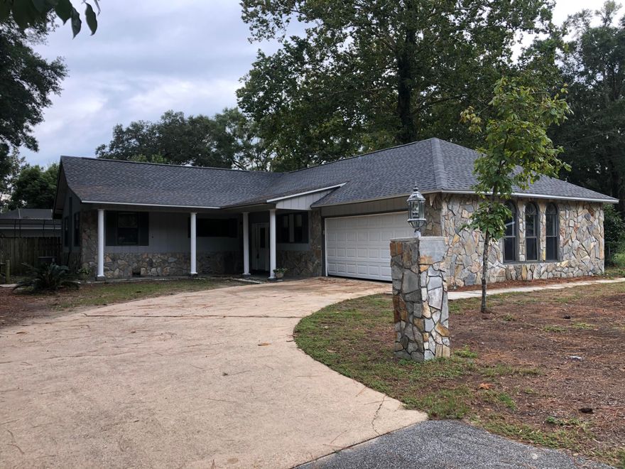 INVESTOR SPECIAL!!! Need a new project? This one is too good to pass up. 1842 sq ft 4 bedroom 2.5 bath rehab home, 1 bed 1 bath 725 sq' mother-in-law cottage bringing in $600 rent, and an additional .19 Acre buildable lot facing Cedar St. New roofs were installed in April on both buildings, pool liner and both septic systems are less than 2 years old. Awesome 18x36' pool with screen enclosure. This property will not qualify for VA or FHA as there is considerable wood rot to the T1-11 siding, but should qualify for conventional and as always, cash is King!