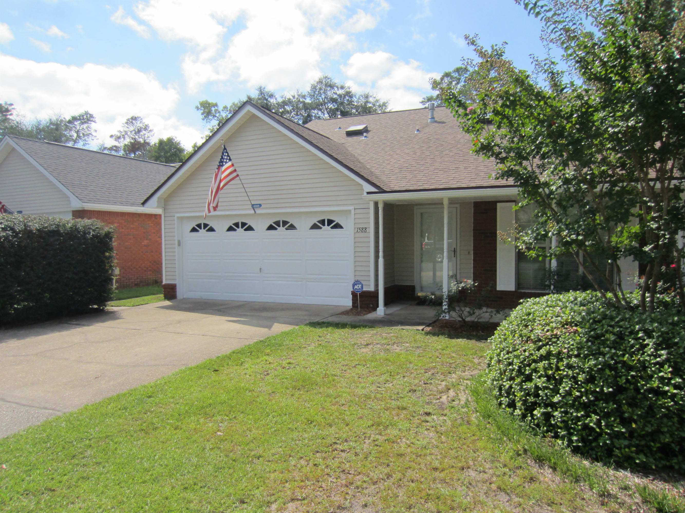 This well kept home features plenty of natural light and has the ease of an open floorplan. The kitchen is open withan island for convenience. Flooring is tile for both kitchen and dining area.Family room is a good size with gas fireplace. Bonus room, on the second level, offers great versatility for shared bedrooms. H/AC is a Trane and was replaced approx. 4 years ago along with roof. Sellers have added a security system and new deck. Exceptionally large back yard is completely fenced and has plenty of room for play, pets, garden and entertaining.