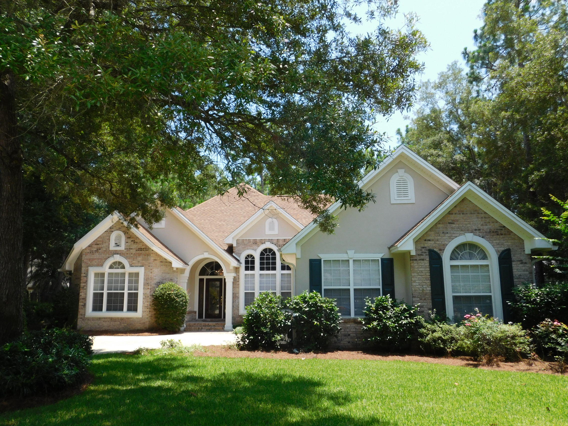 Welcome home to this custom built one owner home. Lot's of custom woodwork through out. Wood floors in most of the home. Carpet in Master and one of the bedrooms. Custom built ins in the Family room with gas fireplace and custom mantle. Formal Dining room with 12' ceilings. Kitchen offers 5 burner electic cooktop, custom white cabinets, corian countertops, breakfast bar, double oven and large walk in pantry. Eat in kitchen looks out to the lush backyard. Large oversized Master suite is large enough for a sitting area. Master bathroom offers a large walk in shower, garden tub, dual sinks, culture marble countertops and Large walk in closet that is 13x6.4. On the other side of the house are two more bedrooms, and full bathroom. Laundry has a sink and lots of custom cabinets.