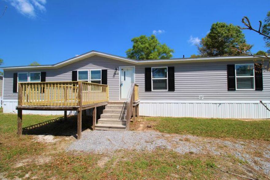2018 4 Bed / 2 Bath manufactured home on a privacy fenced 1/2 acre. Home sits on a cul de sac, no through traffic. Open concept with a family room, kitchen island, utility room with pantry space, split floor plan, large walk in closet off of primary bath. Washer and dryer, stay. Detached 12 x 32 building with single garage door that has electric and A/C. The building is semi finished and could be completed for a man cave/she shed. Make your appointment today.