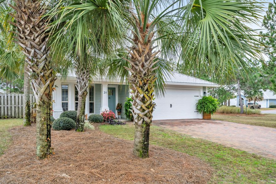 Tucked away just a short stroll from the bay in South Walton you'll find the tranquil community of Eagle Bay. Once here you'll instantly understand the appeal of this community. 21 Golden Eagle is a classic example of what makes this neighborhood so desirable. Immaculately maintained both inside and out, this home exudes Florida charm. It's 1679 square feet are well laid out with generously sized kitchen, living room and master bedroom. Other features of this floorplan include a true separate dining room, large laundry room and 2 car garage. Outside is equally impressive with a comfortable back porch and plenty of privacy - this home borders a large vacant common lot on one side and a portion of the rear backs up to a community pond. Eagle Bay is walking