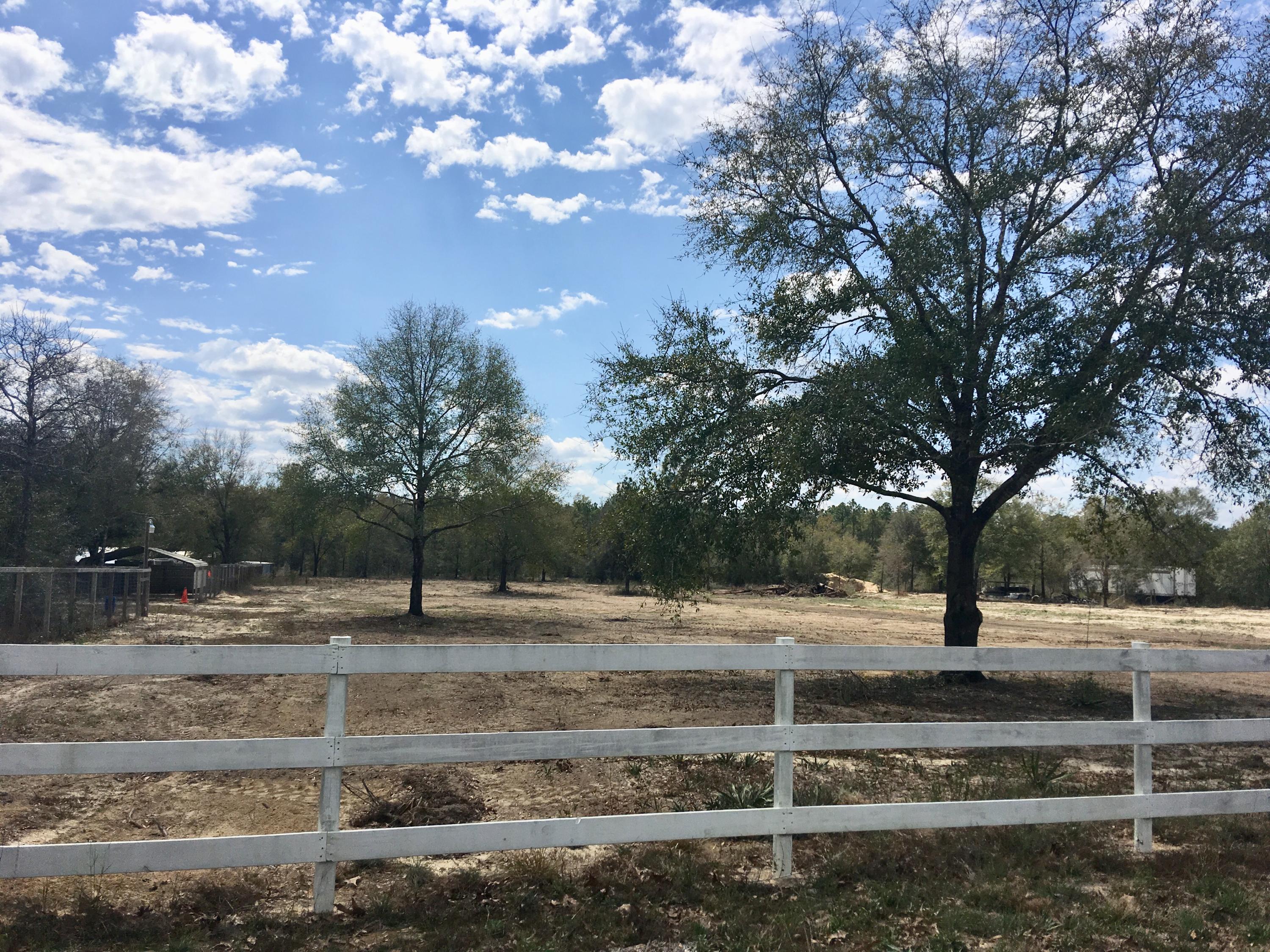 1.4 acre cleared lot on paved road in North Crestview. Beautiful new home site.