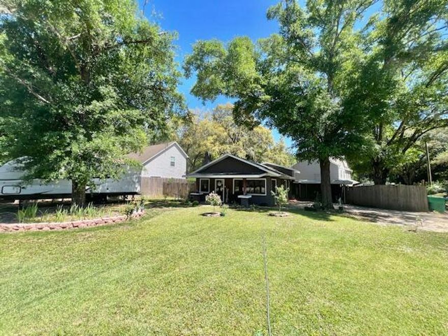 Available July 8 - Pets Considered with Owner Approval!Experience the ultimate coastal living in this impeccably renovated home! Nestled in an unbeatable location, and not far from Lions Park, or a short drive to all the area's best shopping and dining spots. This beautiful home features hurricane-resistant windows, ensuring peace of mind during stormy weather. Inside, a cozy yet open floor plan welcomes you, highlighted by a charming brick fireplace. The kitchen is perfect for culinary enthusiasts, offering ample counter space for all your cooking needs. Modern amenities abound throughout the home, including recessed lighting, new carpeting, freshly updated kitchen