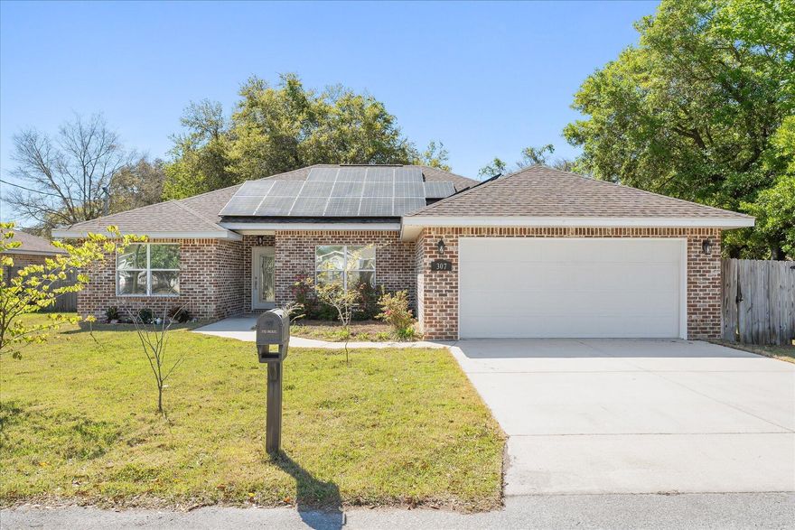 Welcome to 307 Friar Tuck Rd, a single-family home nestled in the heart of Mary Esther, Florida. This sanctuary boasts of the perfect blend of comfort and modern amenities ready for your immediate enjoyment.

Step inside and indulge in comfort. The open family room effortlessly flows into an eat-in kitchen equipped with granite countertops, a breakfast bar and nook, and stainless steel appliances. Your culinary endeavors will find a perfect partner in this delightful space with wood-style tile flooring throughout.

Relish the comfort of the primary bedroom, adorned with a walk-in closet and tray ceiling. The split bedroom floor plan adds a layer of privacy, while the double vanity in the primary bathroom supplements convenience to your daily routine.

The exterior features a fenced backyard, tinted windows and a covered patio, perfect for afternoon relaxation or entertaining guests. The added bonus of an irrigation system makes maintaining the lushness of your outdoor haven a breeze. 

Energy-conscious? You will appreciate the solar panels and the fabric screen storm shutters designed to reduce your carbon footprint while offering additional protection. 

This home is a move-in ready haven, ensuring you can start your new chapter in a home that feels both fresh and familiar. This is not just a property; it's a lifestyle. Seize the opportunity to call this gem your own. Welcome home.