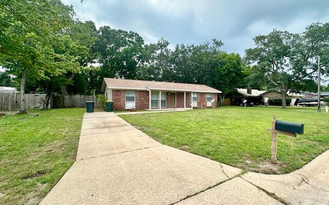 AVAILABLE: 7/30. FLEXIBLE S/D = TO 1 MONTHS RENT CAN BE MADE IN 2 MONTHLY INSTALLMENTS IF QUALIFIED. Welcome to the newly remodeled, all-brick, single-story home located centrally in town & close to it all! This home boasts 3 spacious bedrooms, a bonus room & a full bathroom. The interior has been freshly painted & fitted w/ new LVP flooring throughout, giving it a modern & stylish look. The kitchen is equipped w/ brand new stainless appliances, ready for your culinary adventures. The large, privacy-fenced backyard is perfect for outdoor activities or simply enjoying the Florida sunshine. The house also features a screened patio, providing a comfortable space for relaxation or entertaining guests. A covered front porch adds to the charm of this home. Experience the comfort & convenience of this lovely home! Sorry, no pets/smoking allowed.